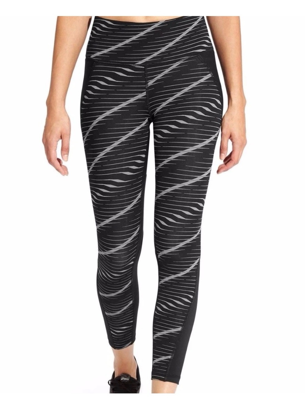 Athleta Waves Stealth 7/8 tight leggings in a black and gray striped size S